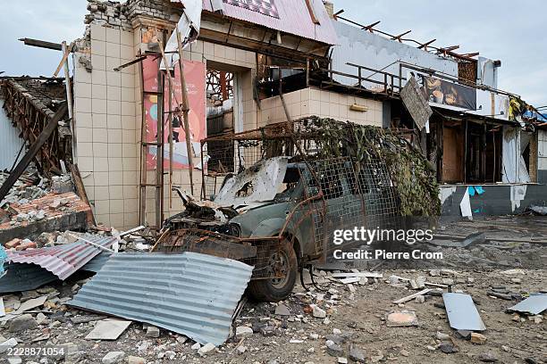 The wreckage of a Ukrainian military vehicle, bombed by a Russian FPV drone, sits at the train station on August 11, 2025 in Kostyantynivka, Ukraine....