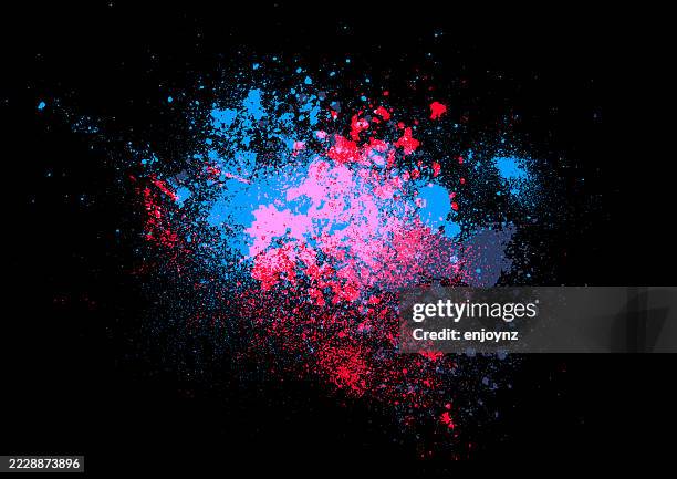 blue and red paint powder splash - paint splash black background stock illustrations