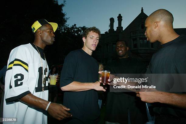 San Antonio Spurs Stephen Jackson, Los Angeles Laker Luke Walton, San Antonio Spurs Malik Rose, and New Jersey Nets Richard Jefferson hangs out...