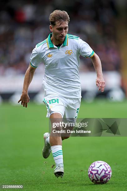 Tommaso Baldanzi of AS Roma runs with the ball during the pre-season friendly match between Aston Villa and AS Roma at Pallet-Track Bescot Stadium on...
