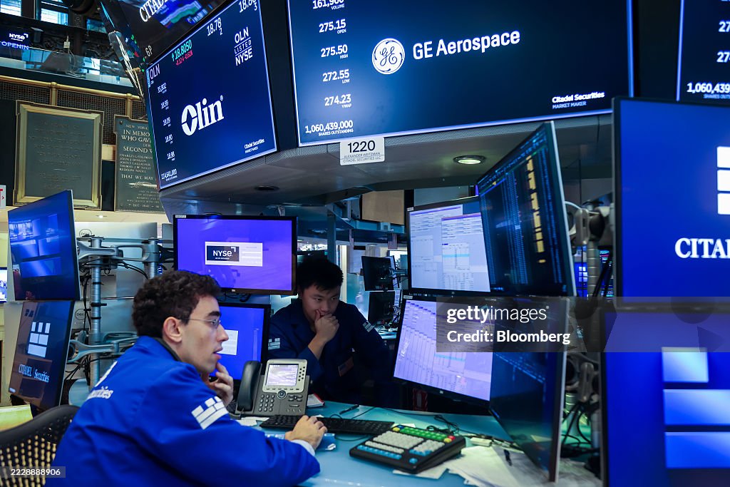 Traders At The NYSE As Stocks Hold Near Record Before Key Inflation Data