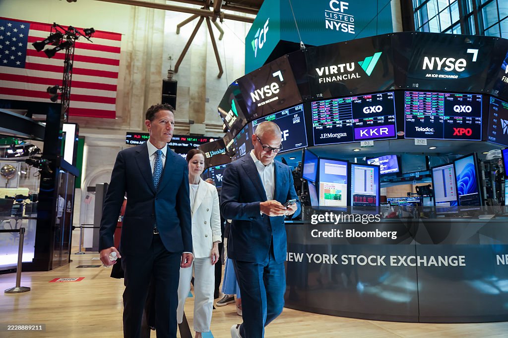 Traders At The NYSE As Stocks Hold Near Record Before Key Inflation Data