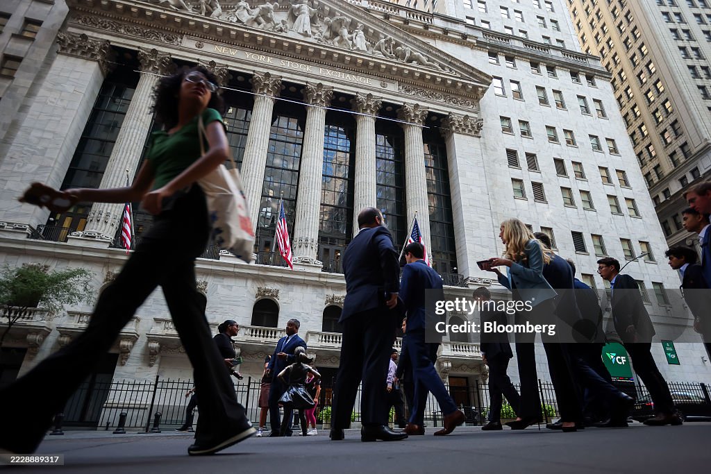 Traders At The NYSE As Stocks Hold Near Record Before Key Inflation Data