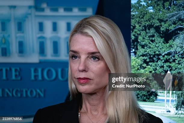 Donald Trump Press Conference Attorney General Pam Bondi, listens to President Donald Trump speak ...
