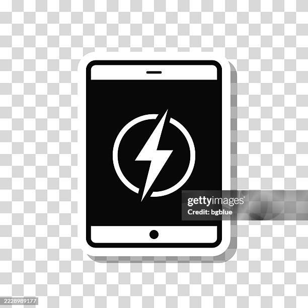 tablet pc with electricity symbol. icon sticker on blank background - loading-pc stock illustrations