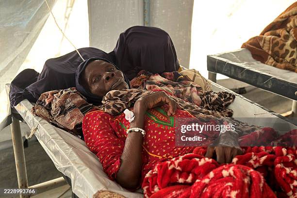 Cholera infected patient receives treatment in the cholera isolation centre at the refugee camps of western Sudan, in Tawila city in Darfur, on...
