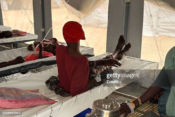 Cholera infected patients receive treatment in the cholera isolation centre at the refugee camps of western Sudan, in Tawila city in Darfur, on...
