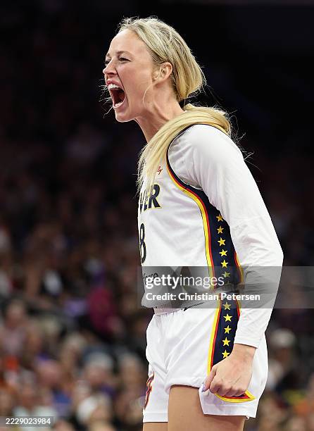 Sophie Cunningham of the Indiana Fever reacts to a three-point shot against the Phoenix Mercury during the second half of the WNBA game at PHX Arena...