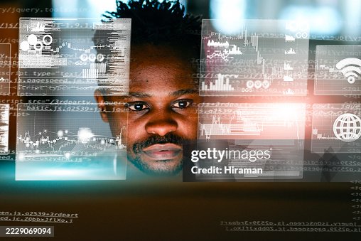 Focused Programmer Analyzing Data With Multiple Digital Interfaces and Graphical Overlays Focused Programmer Analyzing Data With Multiple Digital Interfaces and Graphical Overlays