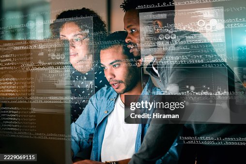 Team of Programmers Working Collaboratively with Digital Code Overlays in Modern Office Team of Programmers Working Collaboratively with Digital Code Overlays in Modern Office