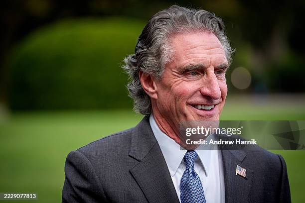 Interior Secretary Doug Burgum walks to a television interview on the North Lawn of the White House on August 12, 2025 in Washington, DC. Burgum...