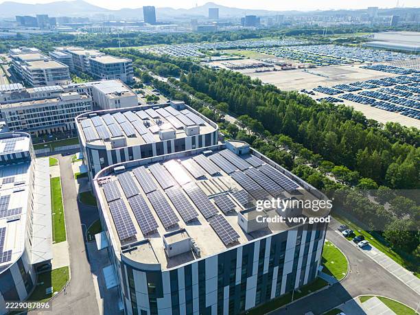 solar power station on factory rooftop - power supply stock pictures, royalty-free photos & images