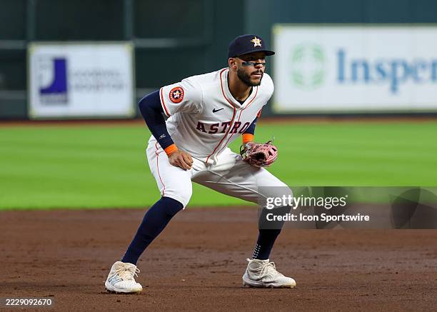 Houston Astros third baseman Carlos Correa watches the batter in the top of the second inning during the MLB game between the Boston Red Sox and...