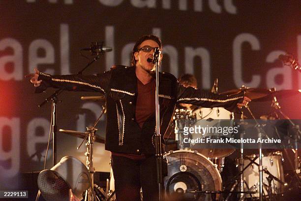 Singer Bono performing on the Super Bowl XXXVI - Halftime Show at the Louisiana Superdome in New Orleans, LA., 2/3/02. Photo by Frank Micelotta/Getty...