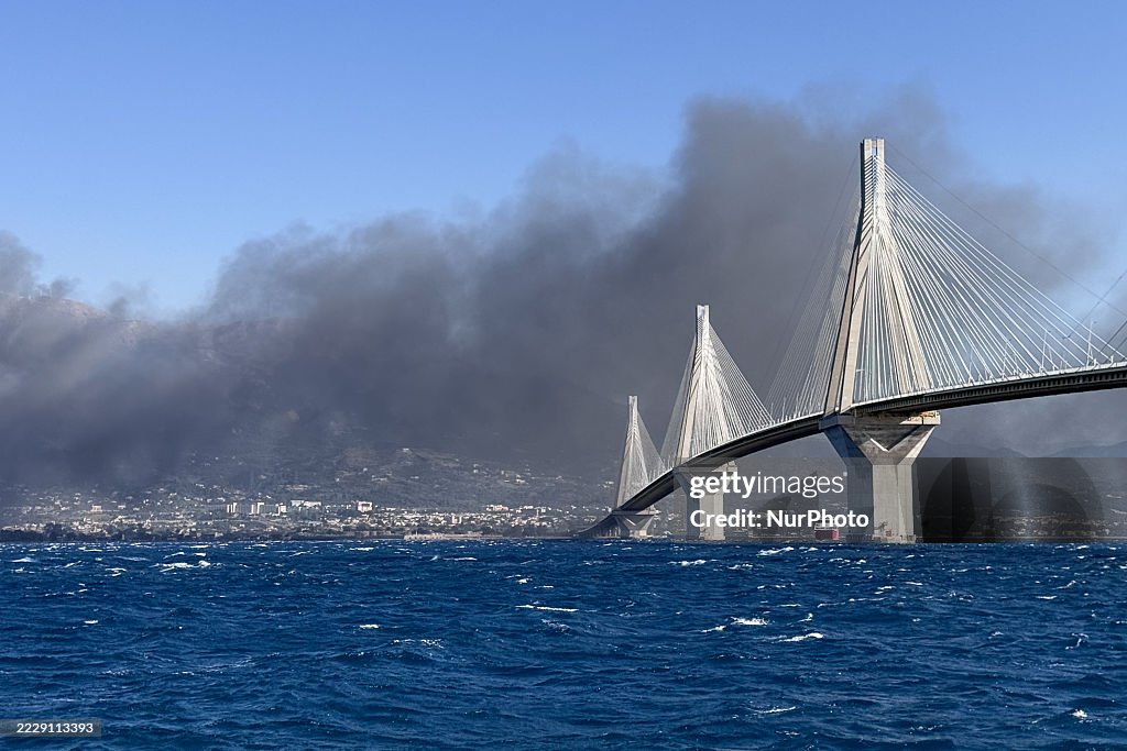 Wildfire Smoke Over The Iconic Rio-Antirrio Bridge.