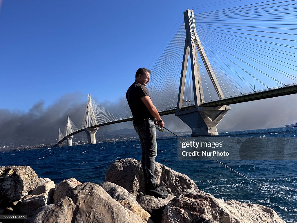 Wildfire Smoke Over The Iconic Rio-Antirrio Bridge.