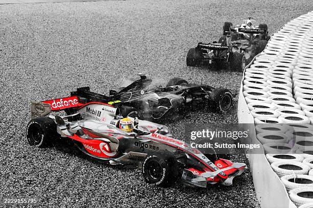 Lewis Hamilton McLaren Mercedes MP4/22 beckons for help as he is joined by a spinning Scott Speed Scuderia Toro Rosso STR2. Formula One World...