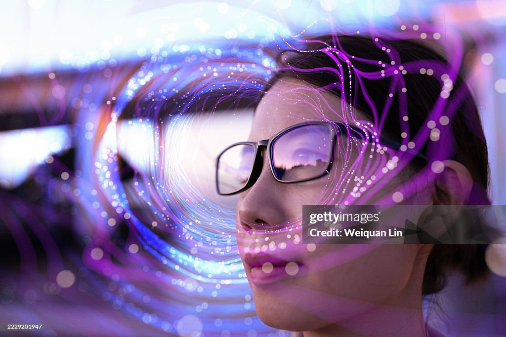 Asian woman using artificial intelligence glasses