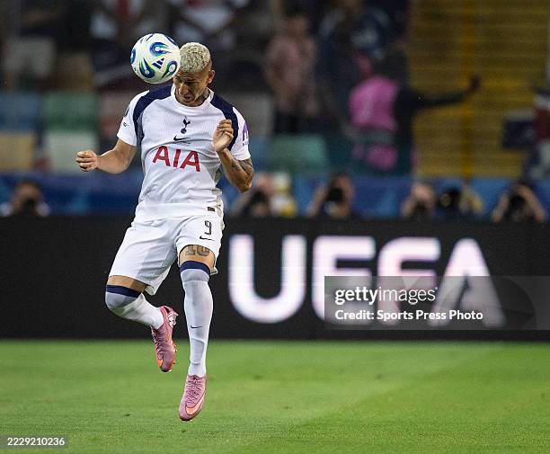 Richarlison of Tottenham Hotspur heads the ball during the UEFA Super Cup 2025 match between Paris Saint-Germain and Tottenham Hotspur at Friuli...