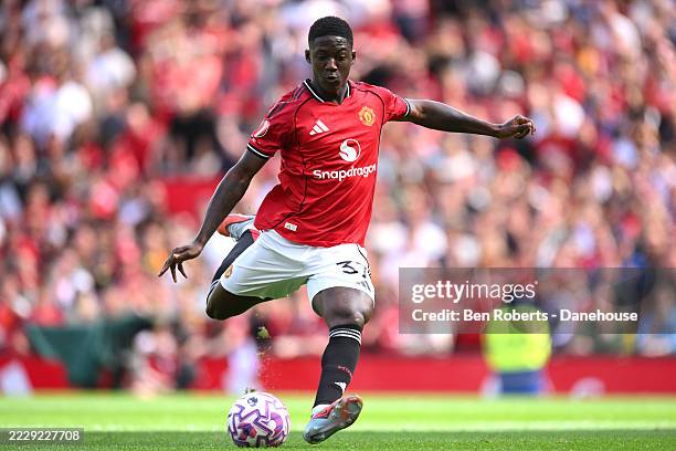 Kobbie Mainoo of Manchester United scores from the penalty spot during the pre-season friendly match between Manchester United and ACF Fiorentina at...
