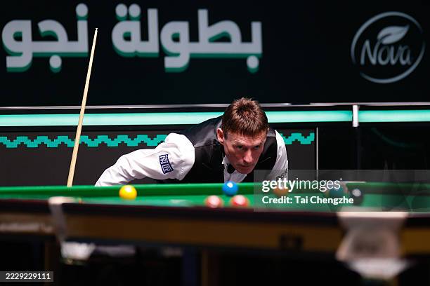Jimmy White of England plays a shot in the first round match against Ken Doherty of Ireland on day 1 of the Saudi Arabia Masters 2025 at Green Halls...