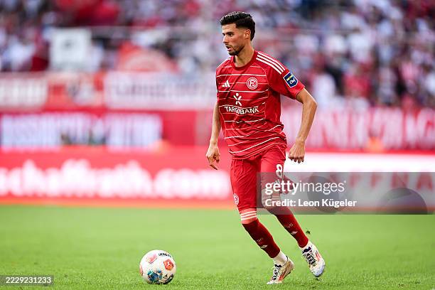 Anouar El Azzouzi of Fortuna Düsseldorf runs with the ball during the 2. Bundesliga match between Fortuna Düsseldorf and Hannover 96 at Merkur...