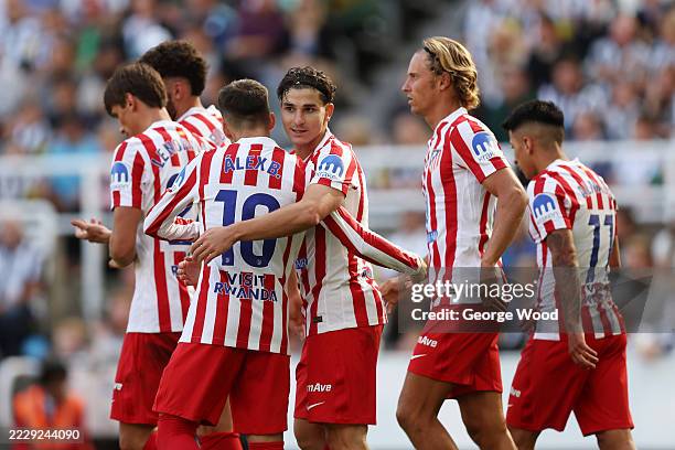 Julian Alvarez of Atletico Madrid celebrates scoring his team's first goal with teammate Alex Baena during the pre-season friendly match between...