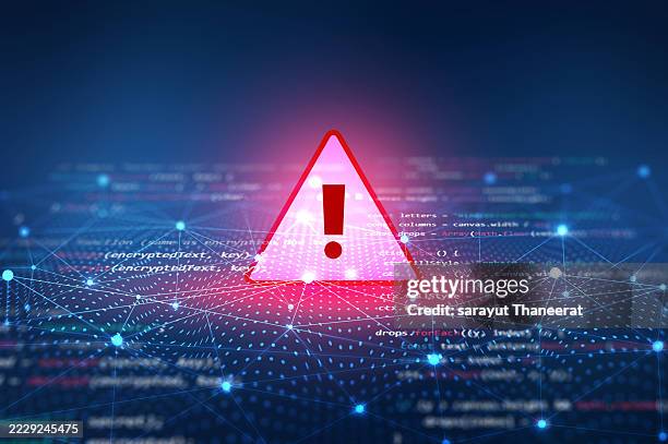 cybersecurity warning alert with digital code and network connections. a digital cybersecurity warning icon with an exclamation mark, displayed over computer code and connected network nodes, symbolizing data security threats and online risk alerts. - bord-in-geval-van-nood stockfoto's en -beelden