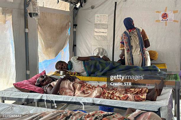 Cholera infected patients receive treatment in the cholera isolation centre at the refugee camps of western Sudan, in Tawila city in Darfur, on...