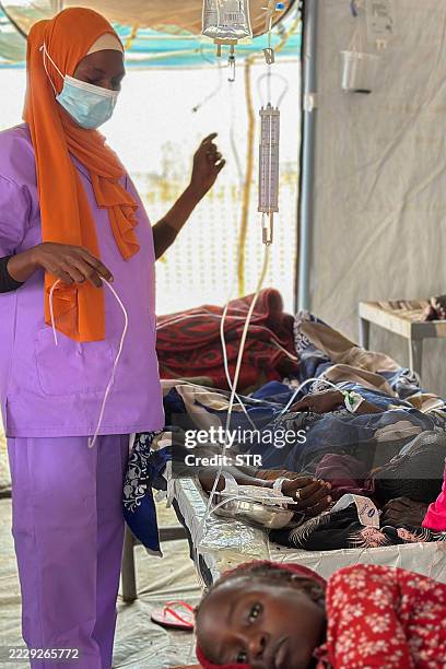 Cholera infected patients receive treatment in the cholera isolation centre at the refugee camps of western Sudan, in Tawila city in Darfur, on...