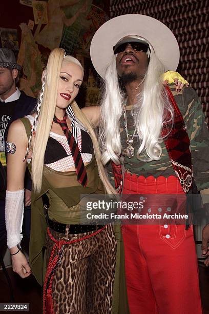 Gwen Stefani of No Doubt and Andre 3000 of Outkast backstage at the MTV Mardi Gras 2002 celebration in New Orleans, La., 2/5/02. Photo by Frank...
