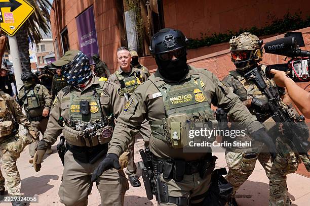 Los Angeles, CA Gregory Bovino, Chief Patrol Agent of the El Centro Sector and Commander-Operation At Large CA , marches with federal agents to the...