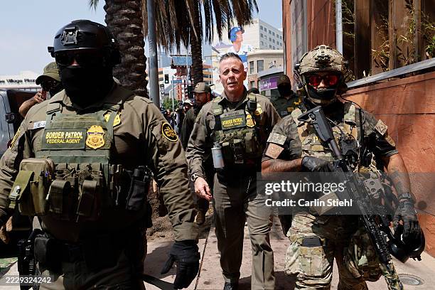 Los Angeles, CA Gregory Bovino, Chief Patrol Agent of the El Centro Sector and Commander-Operation At Large CA , marches with federal agents to the...