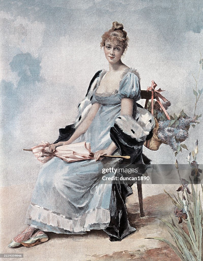 Historie Mode, Porträt einer schönen jungen Frau, die ein Kleid mit Empire-Silhouette trägt, das ein eng anliegendes Oberteil hat, das knapp unter der Brust endet und ein hoch tailliertes Aussehen verleiht, Französisch 19. Jahrhundert