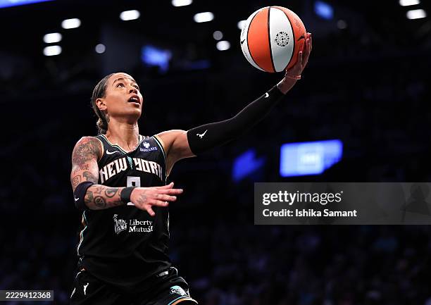 Natasha Cloud of the New York Liberty shoots the ball during the first half against the Minnesota Lynx at Barclays Center on August 10, 2025 in the...