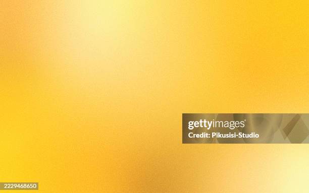 abstract soft spotlit gold grainy background - orange background spotlight stock illustrations