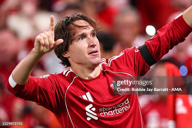 Federico Chiesa of Liverpool celebrates after scoring a goal to make it 3-2 during the Premier League match between Liverpool and Bournemouth at...