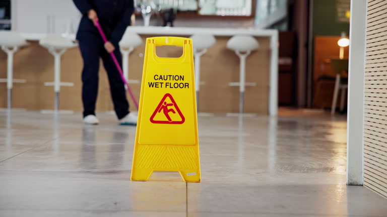 https://media.gettyimages.com/id/2229576932/video/janitor-person-and-office-with-wet-floor-sign-hygiene-service-and-caution-for-disinfection.jpg?b=1&s=640x640&k=20&c=YXEQLC_nmAvNzJrj_O5_YqdtZI0ztFf6A91b2JieLXQ=