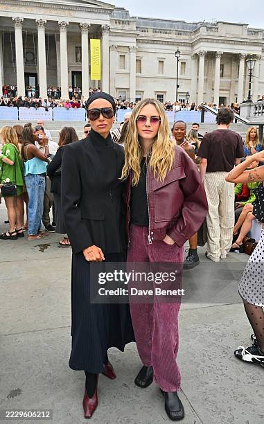 Adwoa Aboah and Cara Delevingne attend the Topshop & Topman Autumn/Winter 2025 Show in Trafalgar Square on August 16, 2025 in London, England.