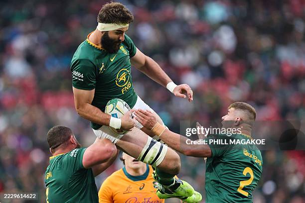 South Africa's lock Lood de Jager catches the ball during the Rugby Championship first round Test match between South Africa and Australia at Ellis...