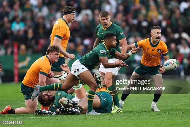 South Africa's scrum-half Grant Williams passes the ball during the Rugby Championship first round Test match between South Africa and Australia at...