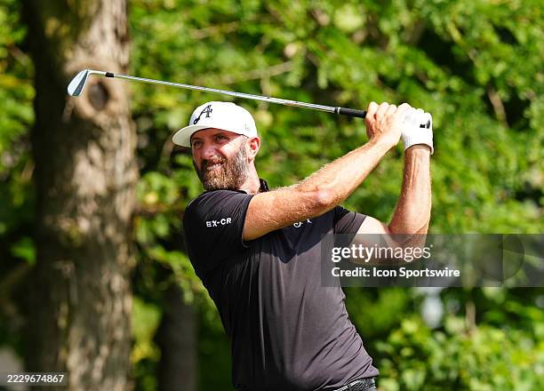Golfer Dustin Johnson of the 4Aces GC plays his tee shot on the third hole during the second round of LIV Golf Indianapolis on August 16 at The Club...