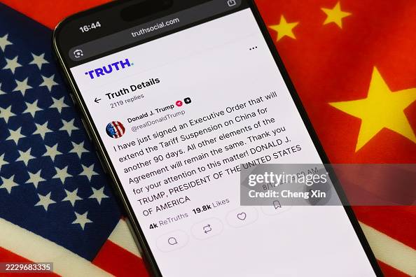 Truth Social post by Donald Trump on tariff suspension extension with U.S. and Chinese flags in background Truth Social post by Donald Trump on tariff suspension extension with U.S. and Chinese flags in background