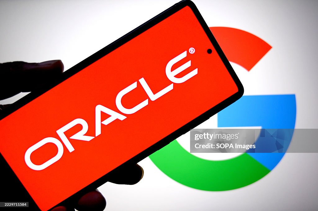 In this photo illustration, an Oracle logo is seen displayed...