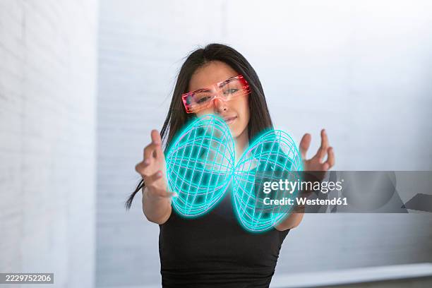 woman using ar glasses to interact with a virtual hologram - woman smart glasses stock illustrations