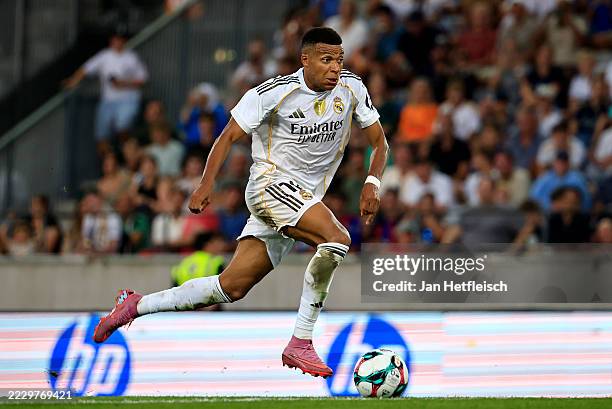 Kylian Mbappe of Real Madrid runs with the ball during the pre-season friendly match between WSG Tirol and Real Madrid CF at Tivoli Stadion Tirol on...