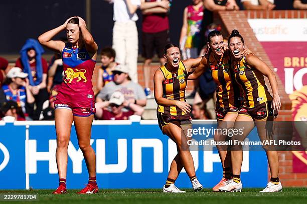 Hawthorn celebrate following the 2025 AFLW Round 01 match between the Brisbane Lions and the Hawthorn Hawks at Brighton Homes Arena on August 17,...