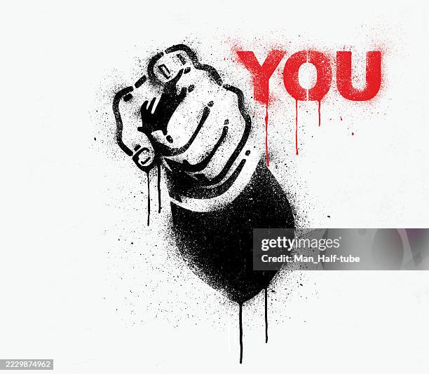 pointing finger graffiti - wall stencil stock illustrations