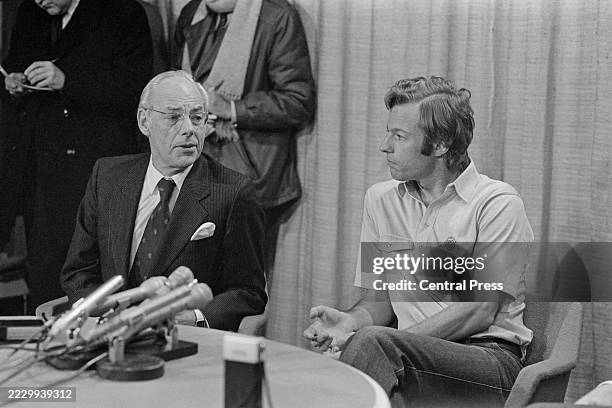 Racing driver and businessman Mark Thatcher, right, seated with his father Denis Thatcher during a press conference at Heathrow Airport, London,...