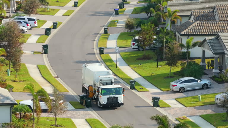 https://media.gettyimages.com/id/2229942888/video/american-garbage-truck-picking-up-trash-bins-on-rural-street-side.jpg?b=1&s=640x640&k=20&c=K5DUQoS-cm8N-DEzPfSi56Wbo1d_qtYvAYCYXn3kFBs=